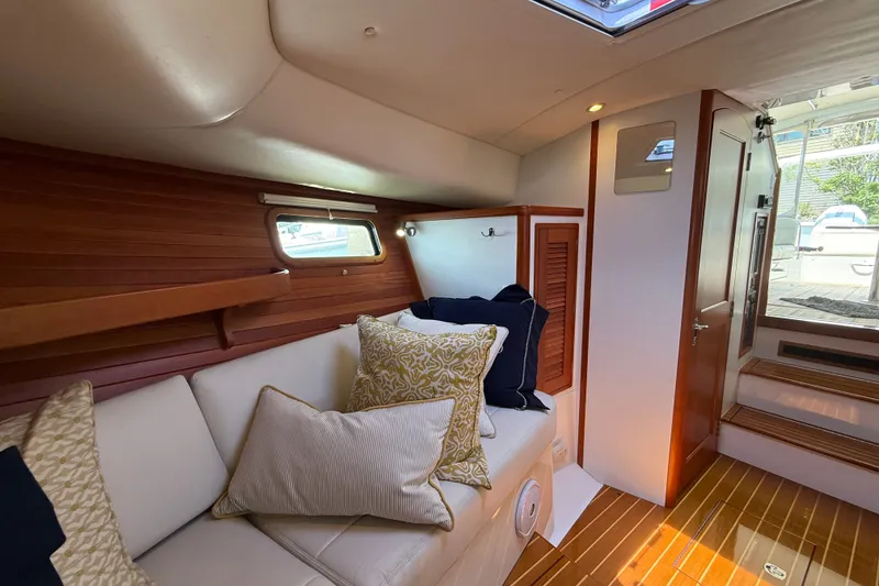 Slide: The Image of Luxurious interior of 2018 MJM 35z yacht with plush seating and elegant wood finishes. - 30