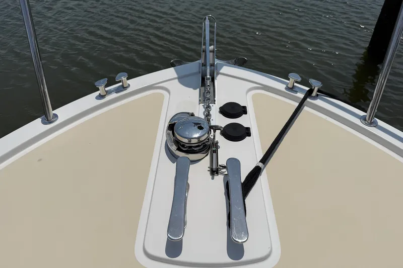 Slide: The Image of Bow of 2018 MJM 35z boat with anchor and cleats in water. - 42