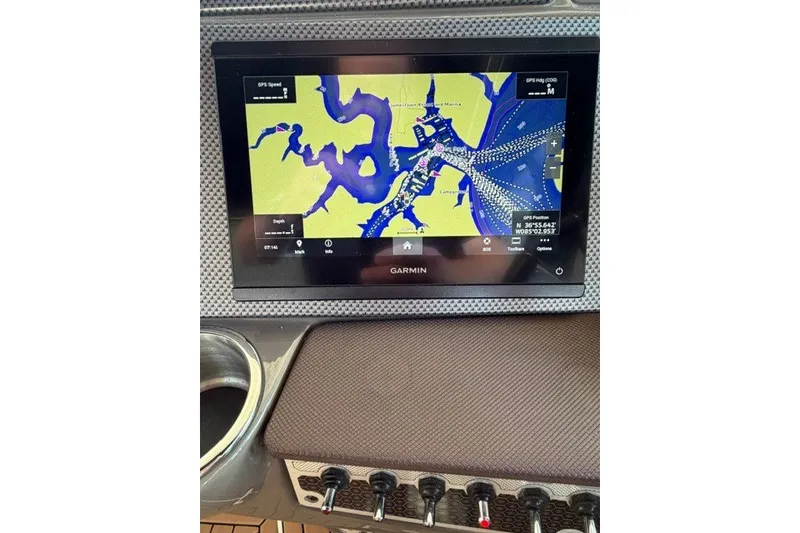 Slide: The Image of Garmin navigation display on 2015 Cruisers Sport Series 328 boat dashboard. - 31