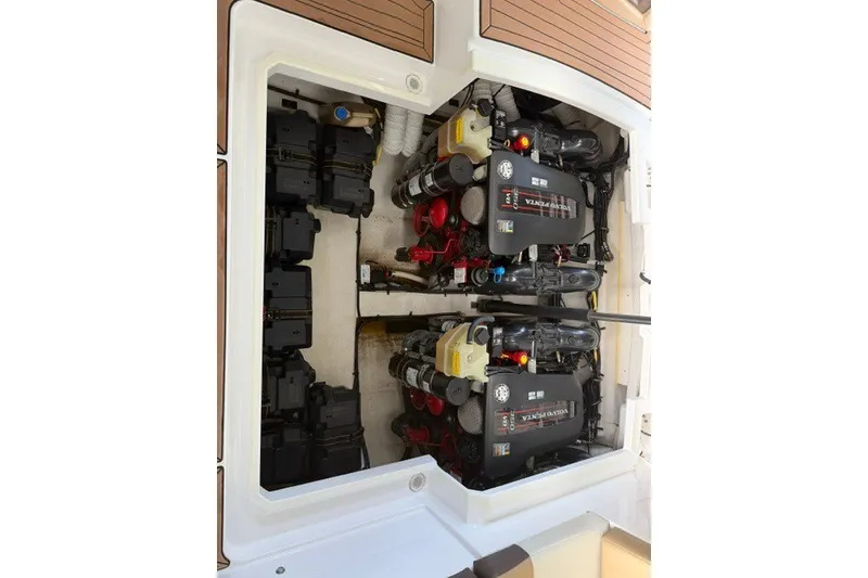 Slide: The Image of Engine compartment of 2015 Cruisers Sport Series 328 with dual Volvo Penta engines. - 29