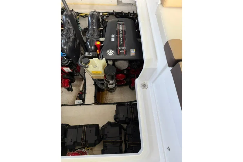 Slide: The Image of Engine compartment of 2015 Cruisers Sport Series 328 boat with Volvo Penta 350 V8 engine. - 28