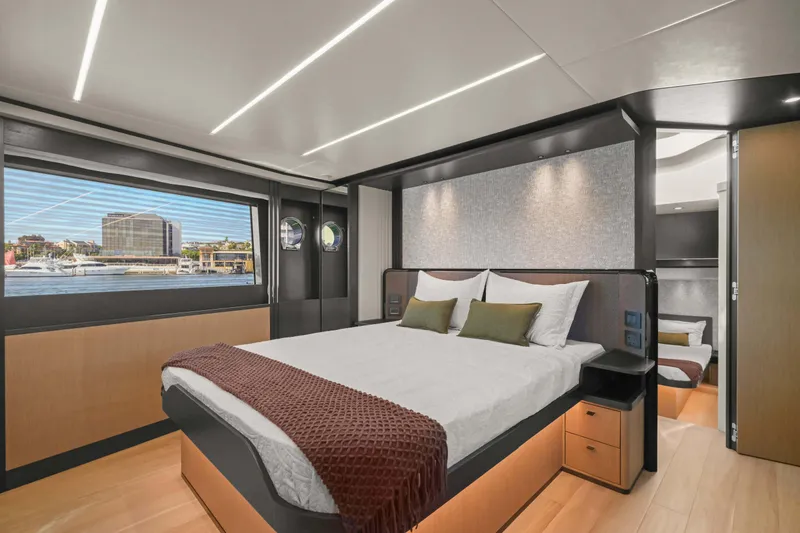 Slide: The Image of Luxurious bedroom interior on 2026 Absolute 52 Fly yacht with scenic window view. - 43