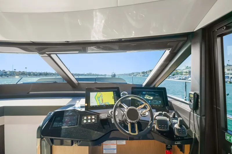 Slide: The Image of Modern helm of 2026 Absolute 52 Fly yacht with advanced navigation systems. - 29