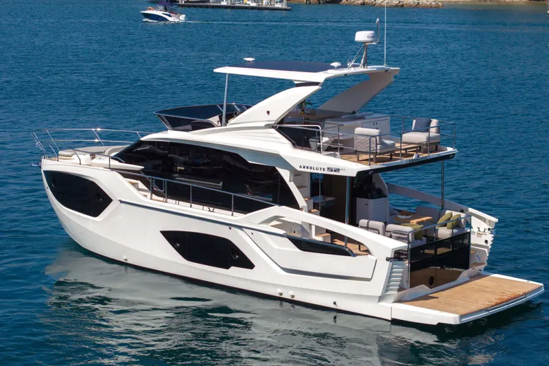 The Image of Luxury Absolute 52 Fly yacht, 2026 model, cruising on serene blue waters. - 0