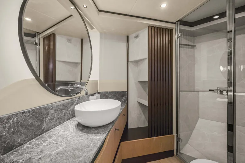 Slide: The Image of Luxurious bathroom interior of 2026 Absolute 52 Fly yacht with modern fixtures and elegant design. - 58