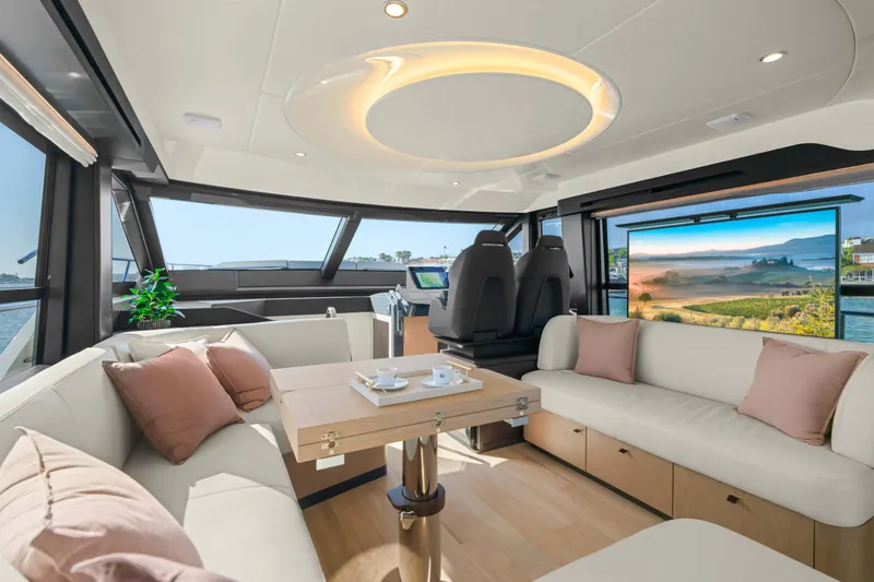 Slide: The Image of Luxurious interior of 2026 Absolute 52 Fly yacht with elegant seating and scenic views. - 32