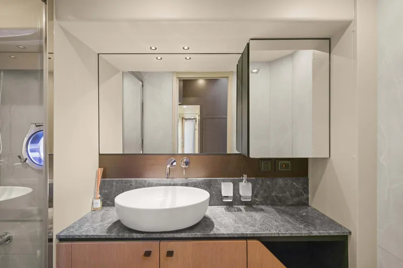 Slide: The Image of Luxurious bathroom interior on 2026 Absolute 52 Fly yacht, featuring modern sink and elegant design. - 55