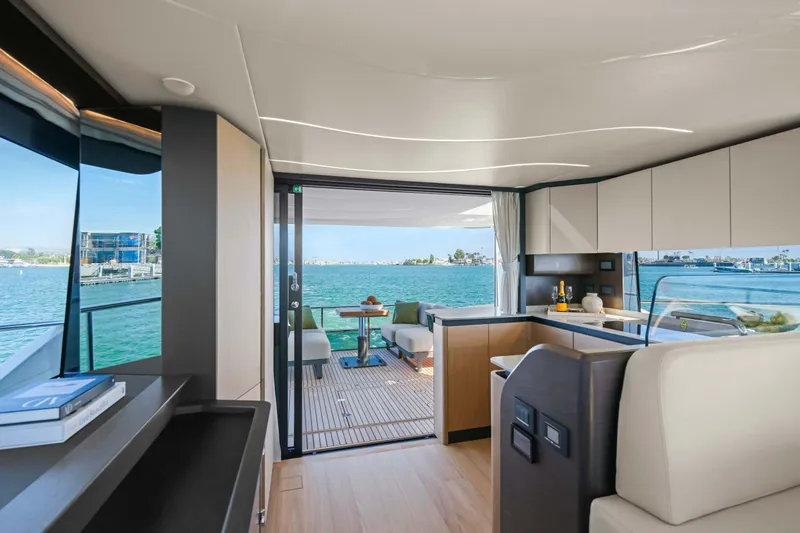 Slide: The Image of Luxurious interior of 2026 Absolute 52 Fly yacht with ocean view and modern design. - 21