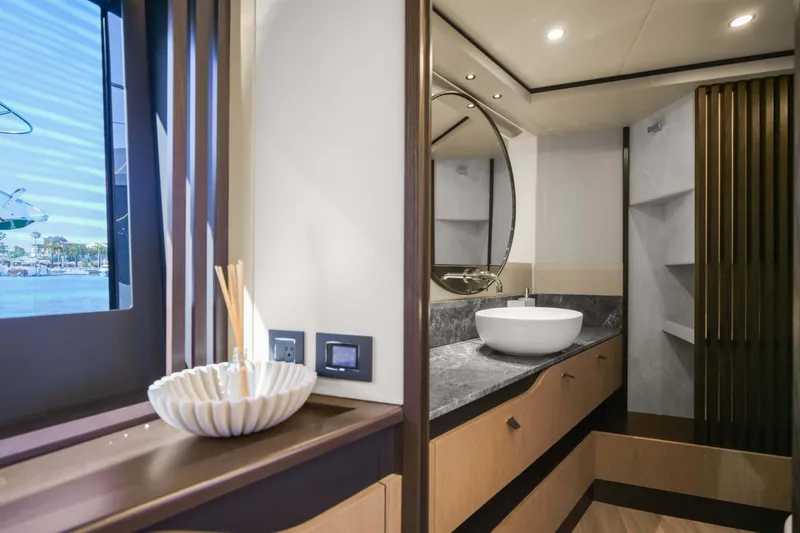 Slide: The Image of Luxurious bathroom interior of 2026 Absolute 52 Fly yacht with modern fixtures and ocean view. - 57