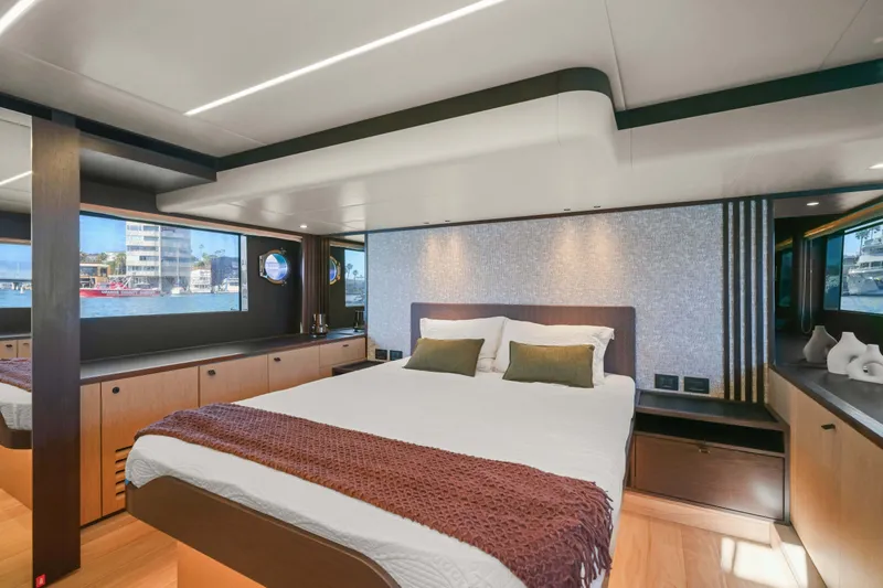Slide: The Image of Luxurious interior of 2026 Absolute 52 Fly yacht with elegant bedroom design. - 45