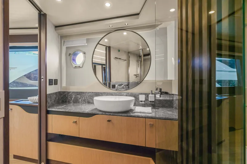 Slide: The Image of Luxurious bathroom interior of 2026 Absolute 52 Fly yacht with modern fixtures and elegant design. - 60