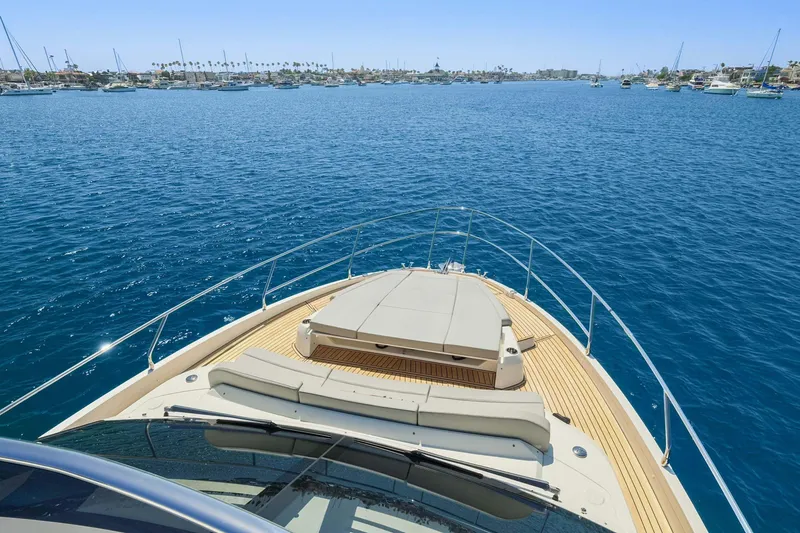 Slide: The Image of Luxury yacht Absolute 52 Fly 2026 cruising on serene blue waters. - 13