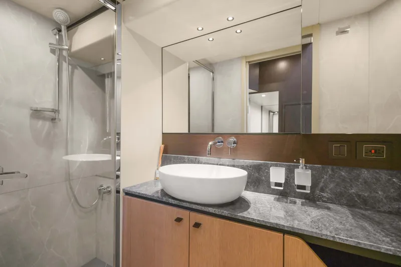 Slide: The Image of Luxurious bathroom on 2026 Absolute 52 Fly yacht with modern fixtures and elegant design. - 54
