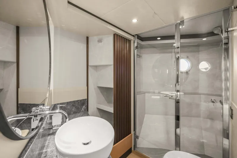 Slide: The Image of Luxurious bathroom on 2026 Absolute 52 Fly yacht with modern fixtures and glass shower. - 59