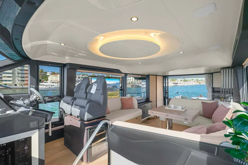 Slide: The Image of Luxurious interior of 2026 Absolute 52 Fly yacht with modern seating and scenic views. - 34