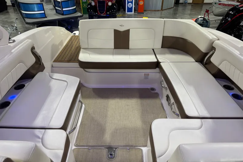 Slide: The Image of Interior of 2016 Chaparral 307 SSX boat with spacious seating and modern design. - 9