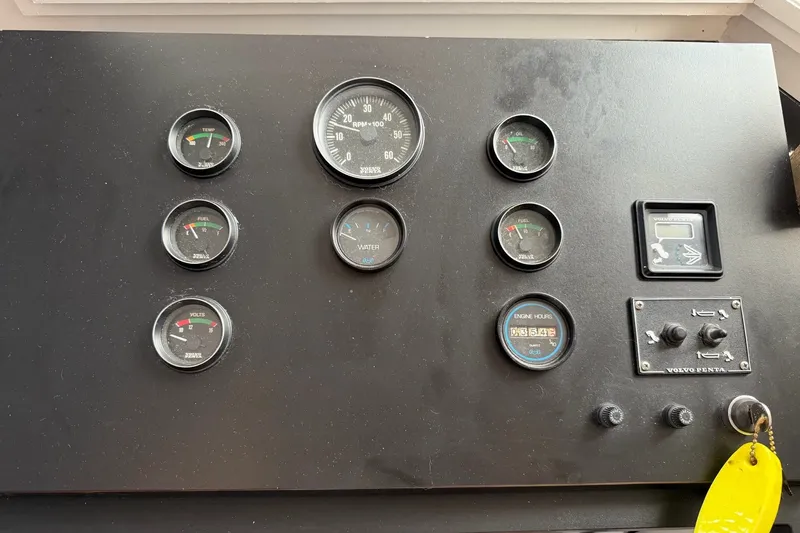 Slide: The Image of Control panel of a 1991 Leisure Time 14x63 with various gauges and switches. - 47