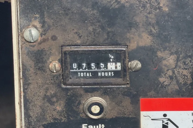 Slide: The Image of Old hour meter on a 1991 Leisure Time 14x63, showing 755.4 total hours. - 46