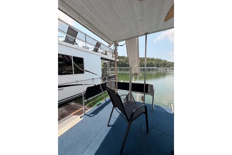 Slide: The Image of Houseboat deck view with chairs overlooking serene lake, Leisure Time 14x63, 1991 model. - 41