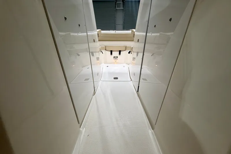 Slide: The Image of 2019 Pursuit DC 325 Dual Console interior with sleek, modern design and spacious layout. - 31