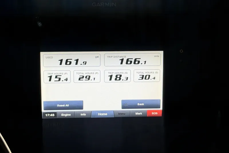 Slide: The Image of Garmin display showing fuel usage and trip data for 2019 Pursuit DC 325 Dual Console. - 17