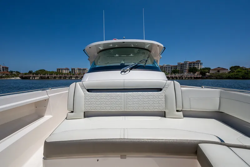 Slide: The Image of 2024 Tiara Yachts 38 LS luxury boat interior with waterfront view. - 21