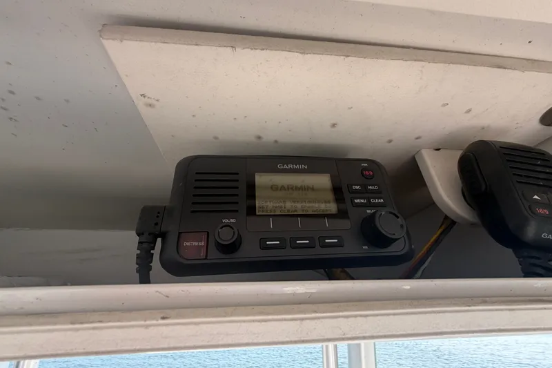 Slide: The Image of Garmin marine radio installed on 2018 Robalo R222 Center Console boat. - 28