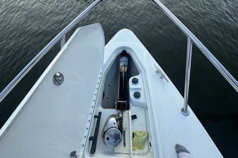 Slide: The Image of Bow of 2009 Formula 400 Super Sport boat with open anchor locker. - 15