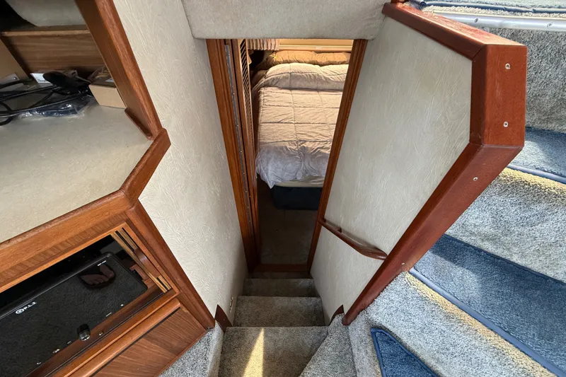 Slide: The Image of Stairway leading to cabin bedroom in 1986 Sea Ray 410 Aft Cabin yacht. - 42