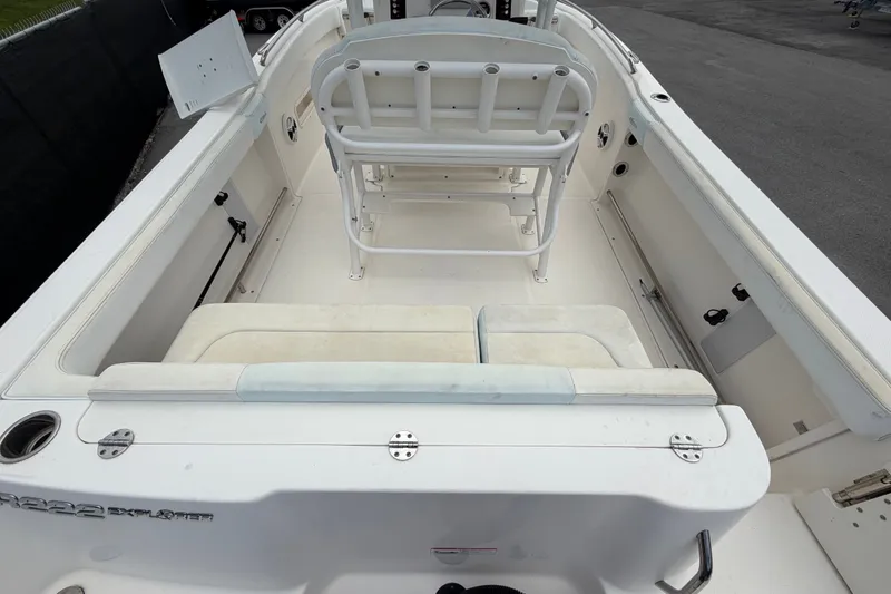 Slide: The Image of 2019 Robalo R222 Center Console boat interior with seating and console view. - 13