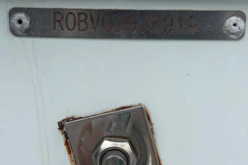 Slide: The Image of Close-up of a 2019 Robalo R222 Center Console boat's identification plate. - 71