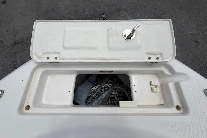 Slide: The Image of An open storage compartment with a key on the lid. - 41