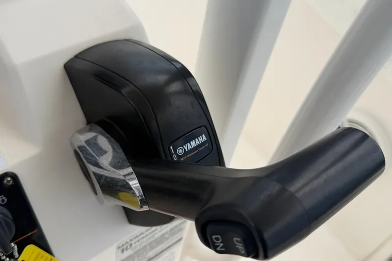 Slide: The Image of Close-up of Yamaha throttle control on 2019 Robalo R222 Center Console boat. - 27
