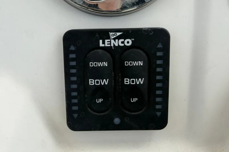 Slide: The Image of Lenco trim tab control on 2019 Robalo R222 Center Console boat. - 28