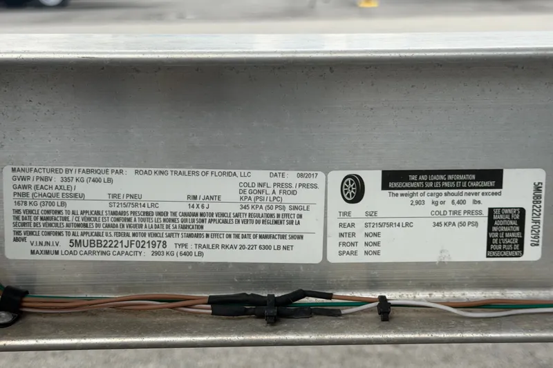 Slide: The Image of Label on a 2019 Robalo R222 Center Console trailer, detailing weight and tire specifications. - 73