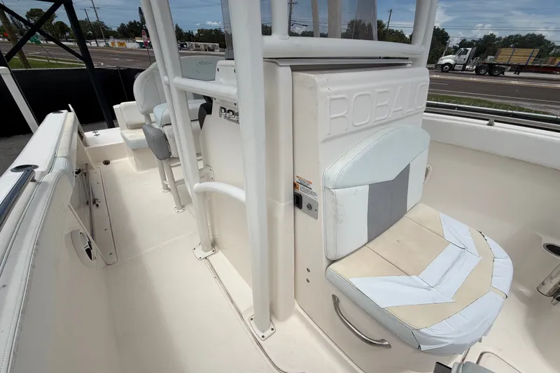 Slide: The Image of 2019 Robalo R222 Center Console boat interior with seating and console details. - 53
