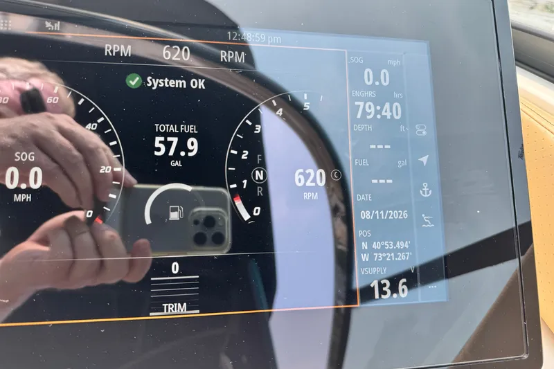 Slide: The Image of Dashboard of 2022 Sea Ray SLX 280 showing fuel and RPM details. - 11