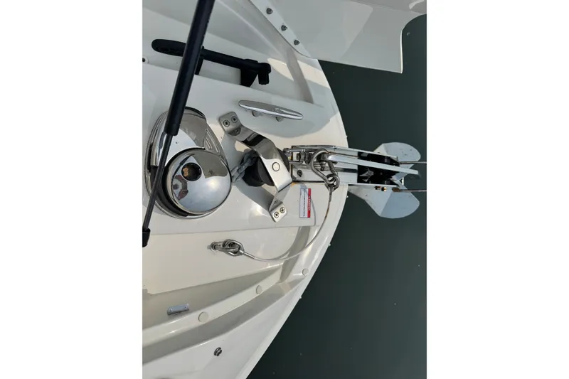 Slide: The Image of 2022 Sea Ray SLX 280 boat anchor system, featuring polished metal components. - 20