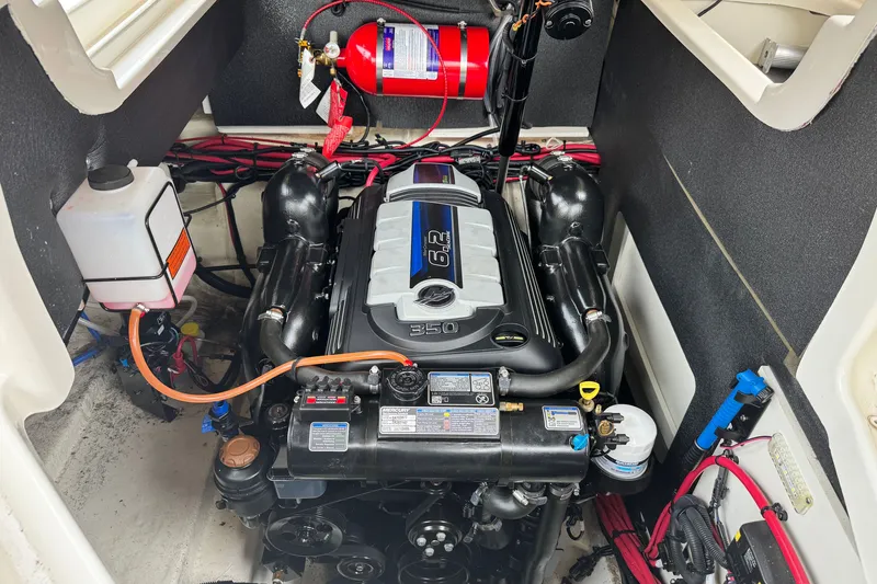 Slide: The Image of Engine compartment of a 2022 Sea Ray SLX 280 boat, featuring a 6.2L engine. - 21