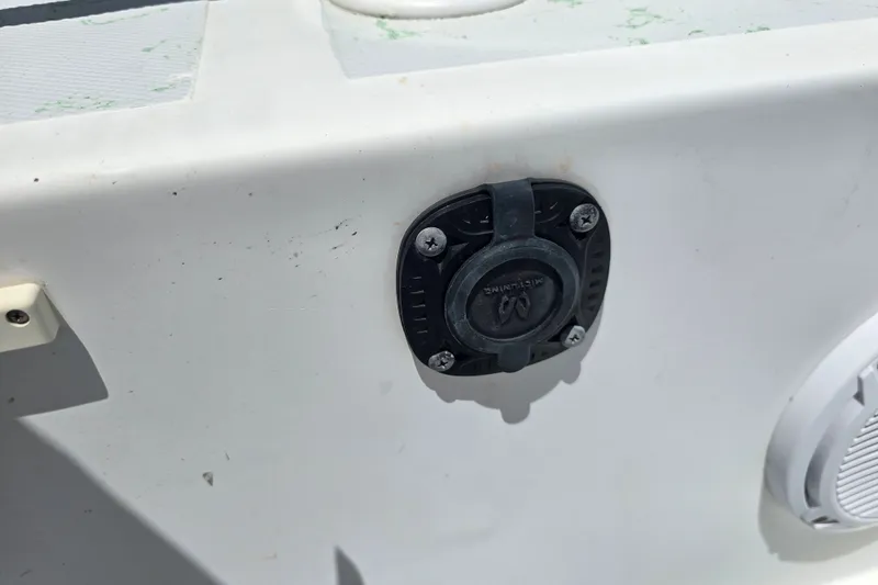 Slide: The Image of Close-up of a 2016 Shallow Sport 24 Modified V boat detail, featuring a mounted accessory. - 31