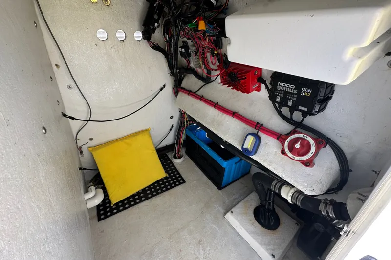 Slide: The Image of 2016 Shallow Sport 24 Modified V boat interior wiring and equipment setup. - 30