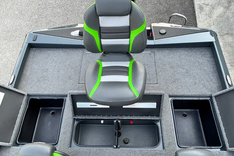 Slide: The Image of 2025 Ranger RT198P boat interior with gray and green seating, storage compartments. - 10