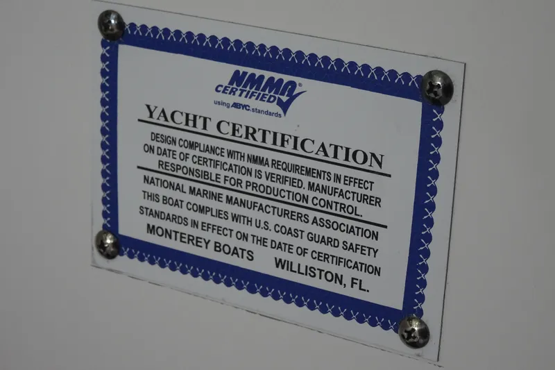 Slide: The Image of Yacht certification plaque for 2025 Monterey Elite 27 OB, NMMA certified. - 23