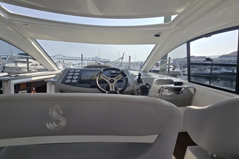 Slide: The Image of Interior view of 2013 Beneteau Gran Turismo 38 yacht cockpit with steering wheel. - 18