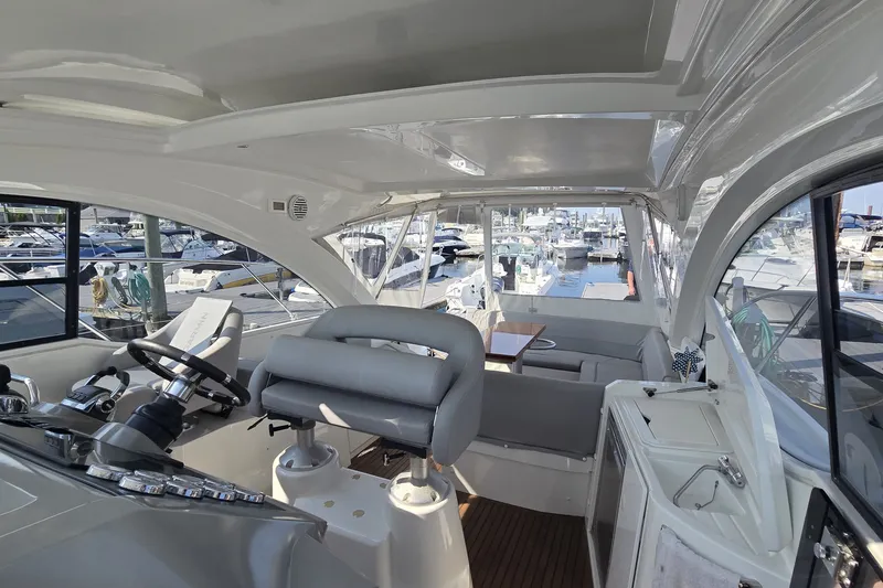 Slide: The Image of Interior view of a 2013 Beneteau Gran Turismo 38 yacht at a marina. - 20