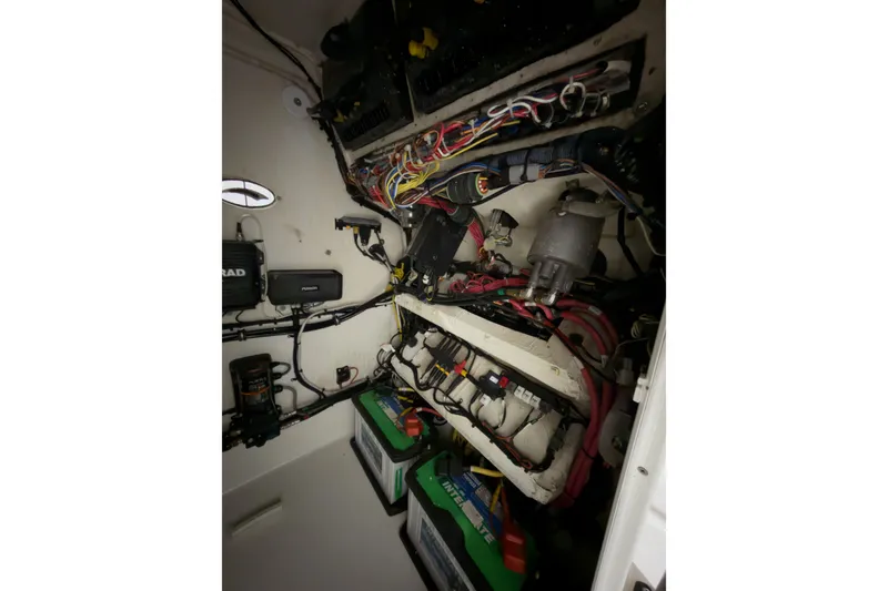 Slide: The Image of Electrical wiring and components inside a 2019 Crevalle 26 Bay boat. - 18