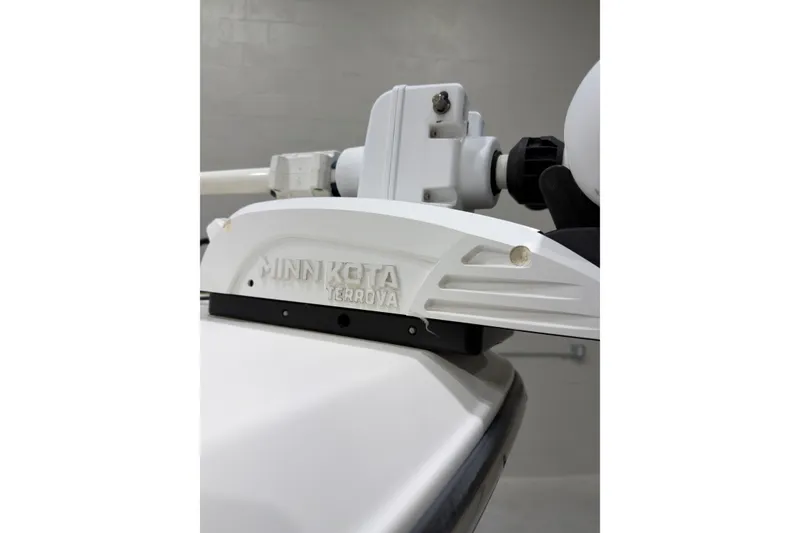 Slide: The Image of Minn Kota Terrova motor on 2019 Crevalle 26 Bay boat, close-up view. - 30