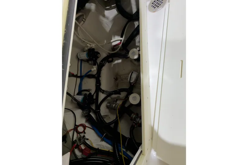Slide: The Image of 2019 Crevalle 26 Bay boat interior wiring and plumbing setup. - 7