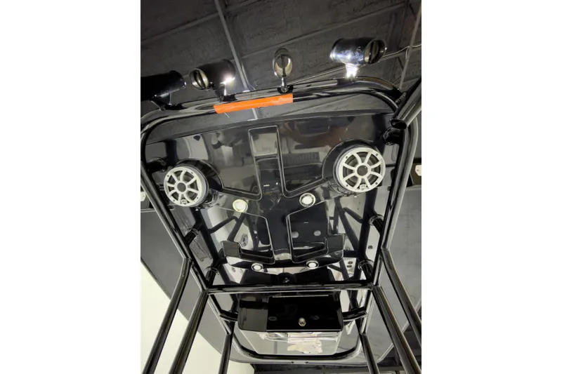 Slide: The Image of 2019 Crevalle 26 Bay boat's T-top with speakers and lights. - 13