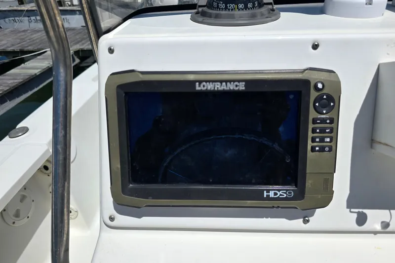 Slide: The Image of Lowrance HDS9 fishfinder on 2008 Triton 240 LTS Pro boat dashboard. - 18